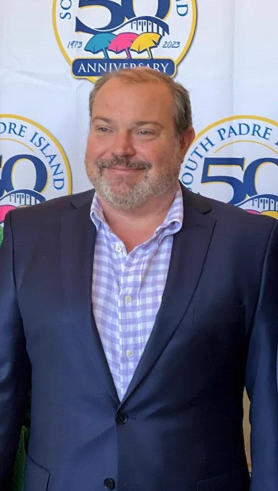Patrick McNulty in a blazer at the South Padre Island 50th anniversary celebration.